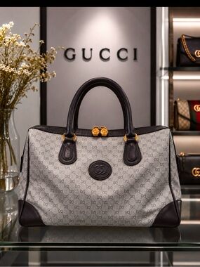 Authentic VintageGucci Gray Monogram Top-Handle Satchel with Navy Leather Trim.